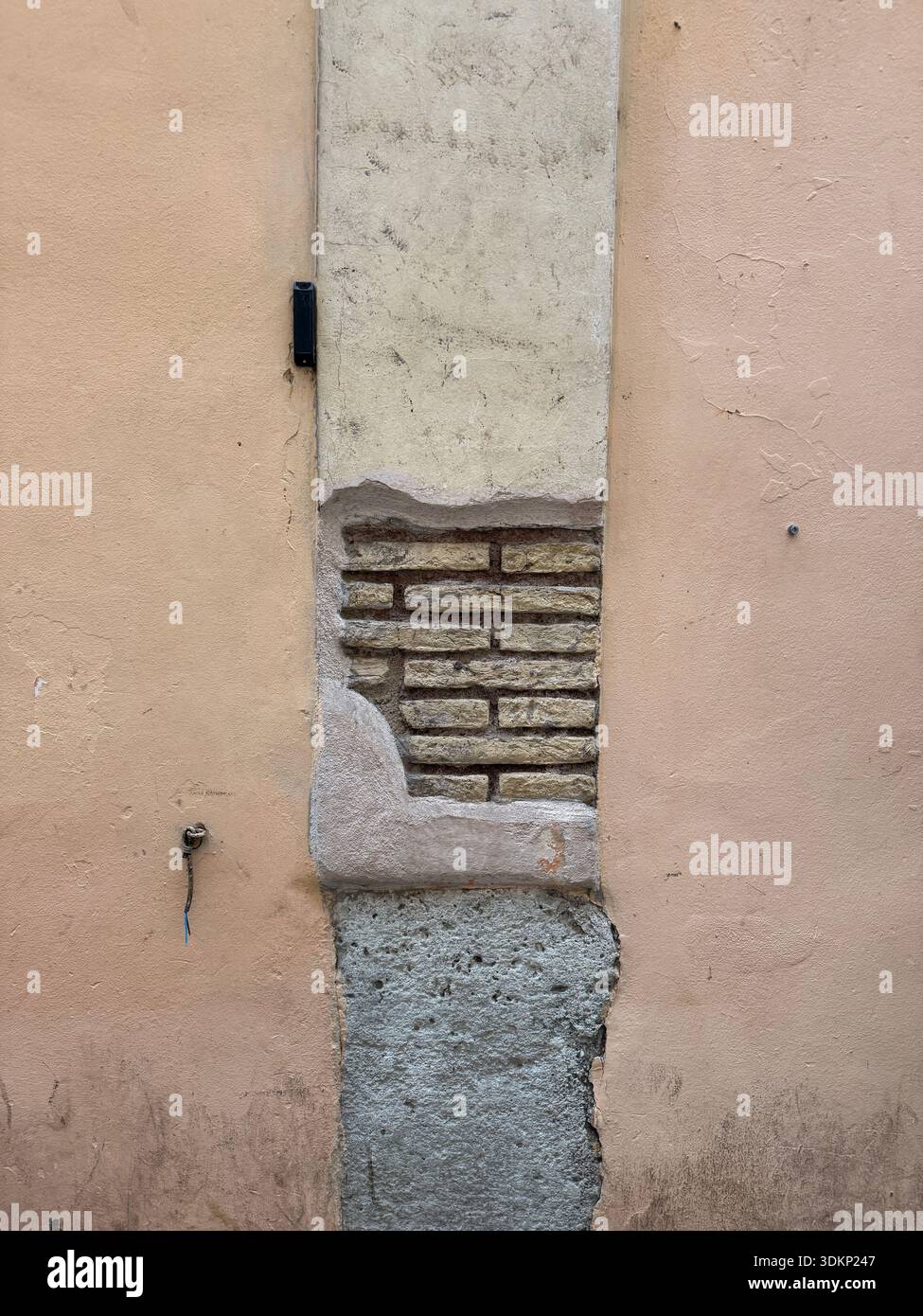 A random weathered brick wall in Rome, Italy Stock Photo