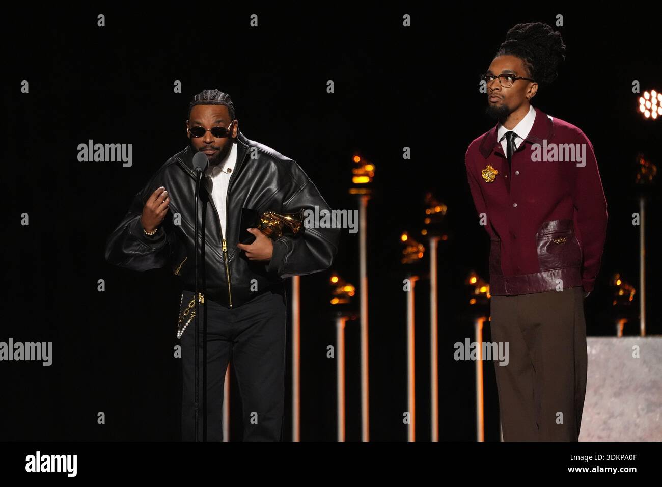 Sounwave, left, and Scott Bridgeway accept the award for best