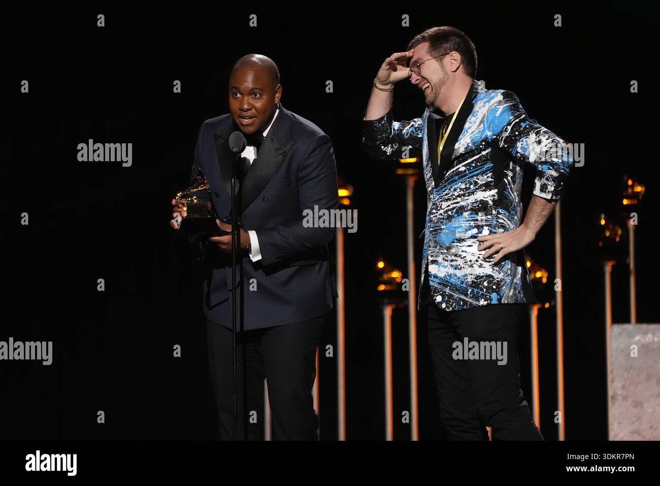 Bryan Carter, left, and Charlie Rosen accept the award for best ...