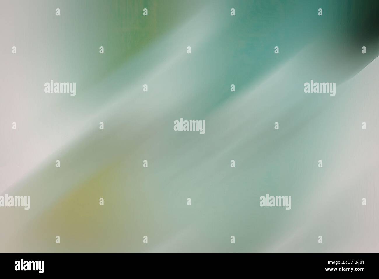 A blurred green gradient background with white accents, creating a soft ...