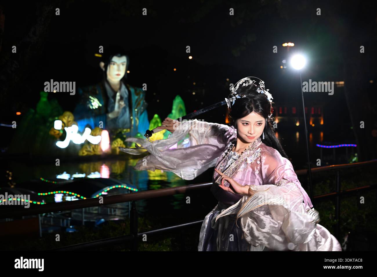 Visitors admire lantersn at the Spring Festival Lantern Show in Yuexiu ...