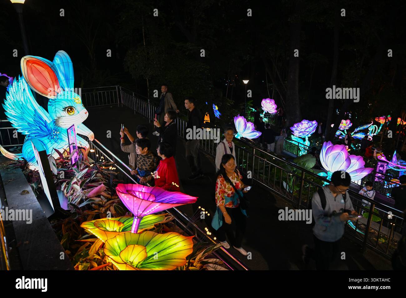 Visitors admire lantersn at the Spring Festival Lantern Show in Yuexiu ...
