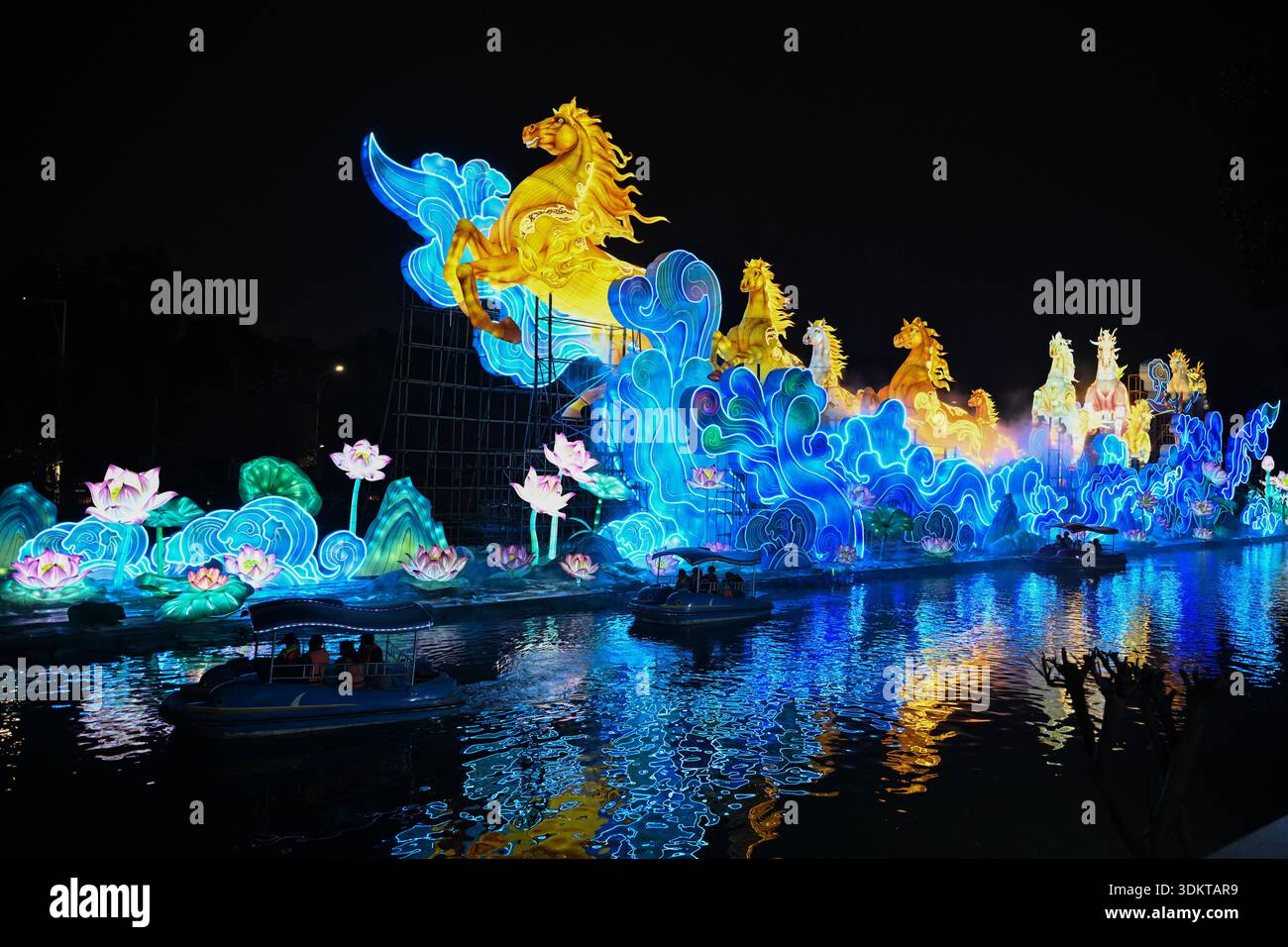 Visitors admire lantersn at the Spring Festival Lantern Show in Yuexiu ...