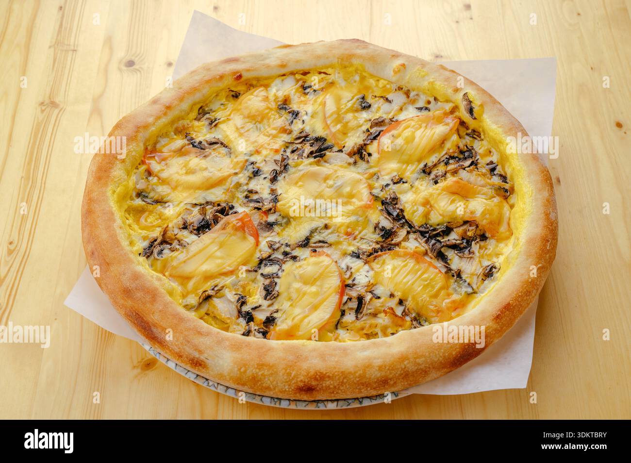 Italian pizza with ham and vegetables Stock Photo