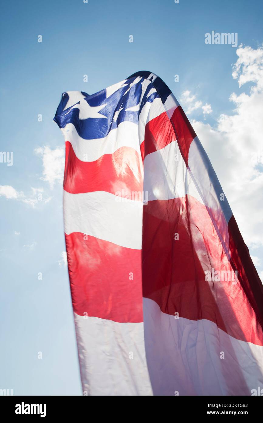 Stars and stripes banner blowing in wind Stock Photo - Alamy