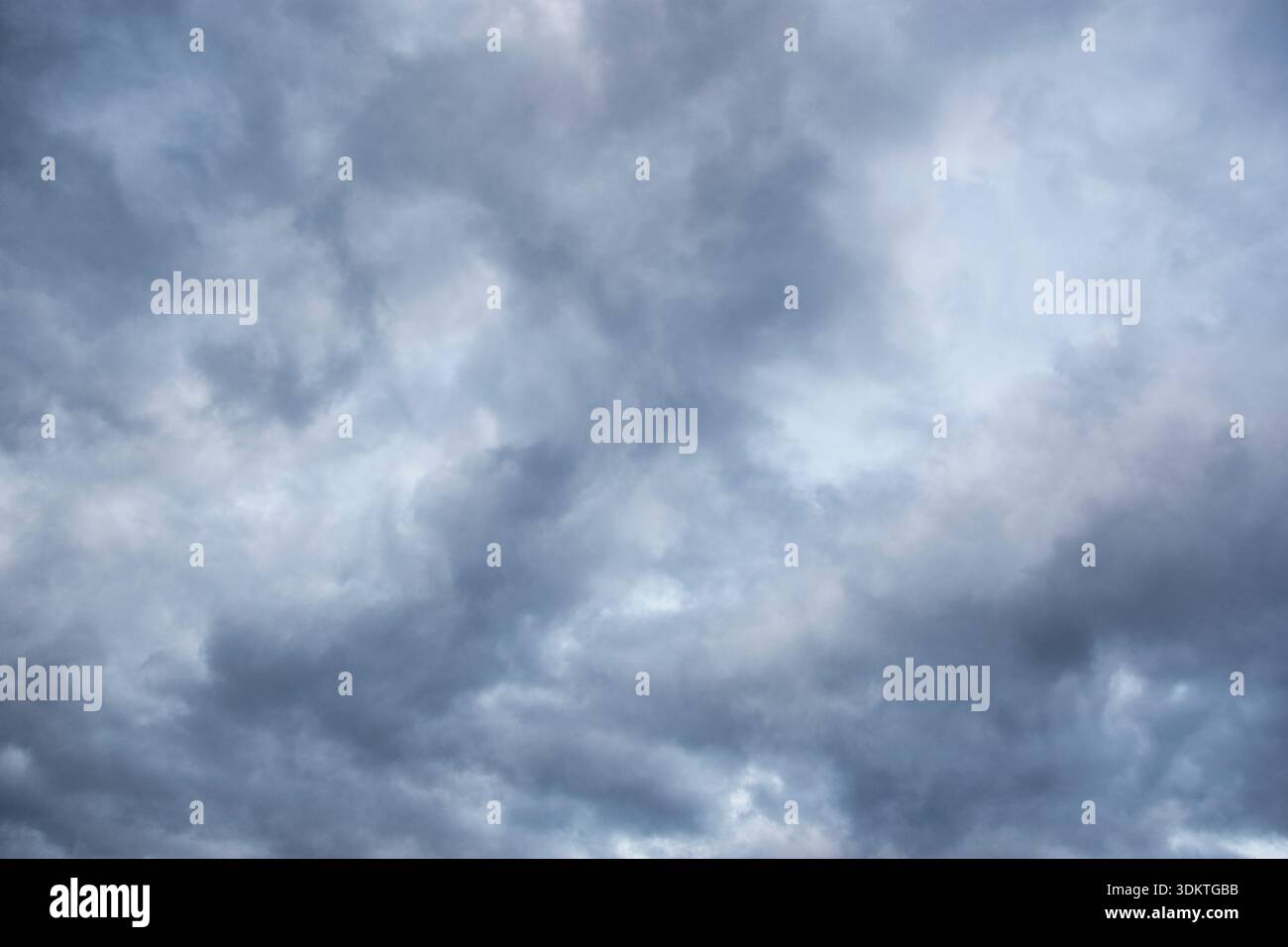 Thick summer storm clouds Stock Photo