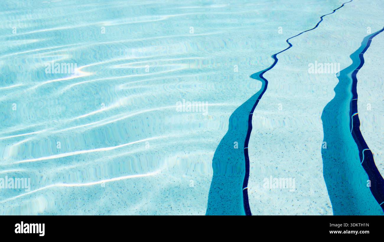 Swimming pool steps and crystal water Stock Photo