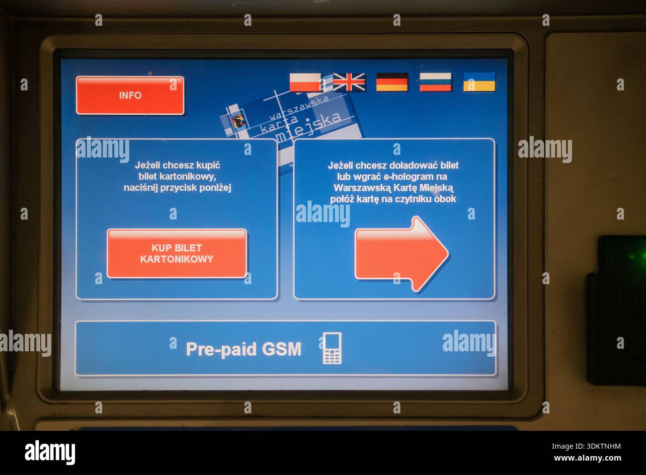 Close view of blue touchscreen ticket vending machine showing ...