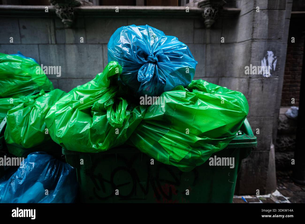 Overflowing trash bins bags hi-res stock photography and images - Alamy