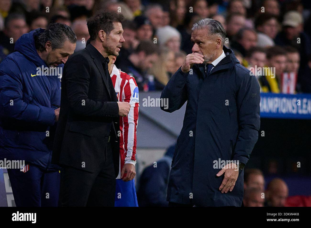 Atletico de Madrid's coach Diego Pablo Cholo Simeone (L) and coach ...