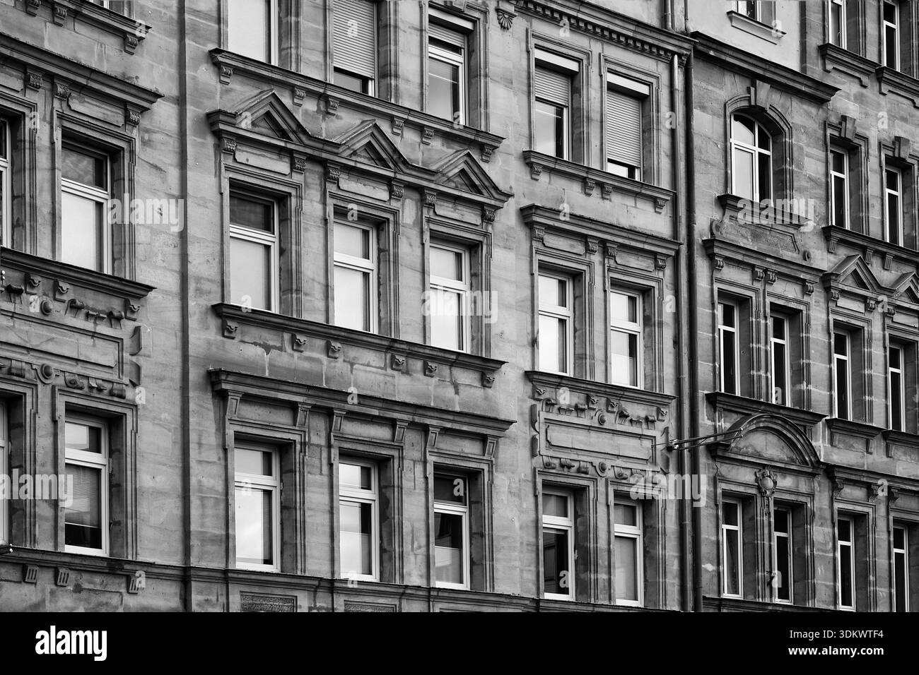 Old building many windows Black and White Stock Photos & Images - Alamy