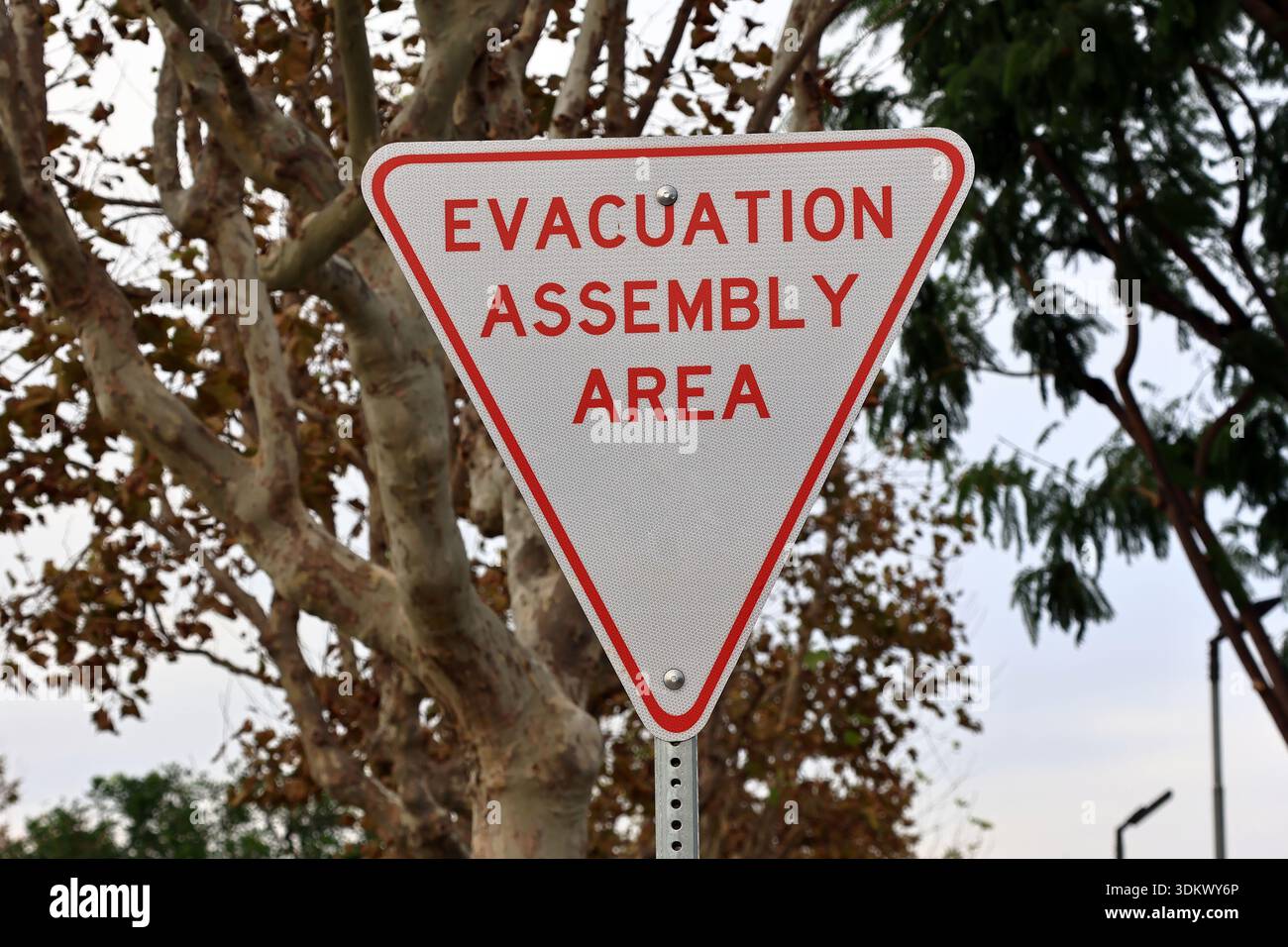 Evacuation Assembly Area Emergency Safety Sign Stock Photo - Alamy