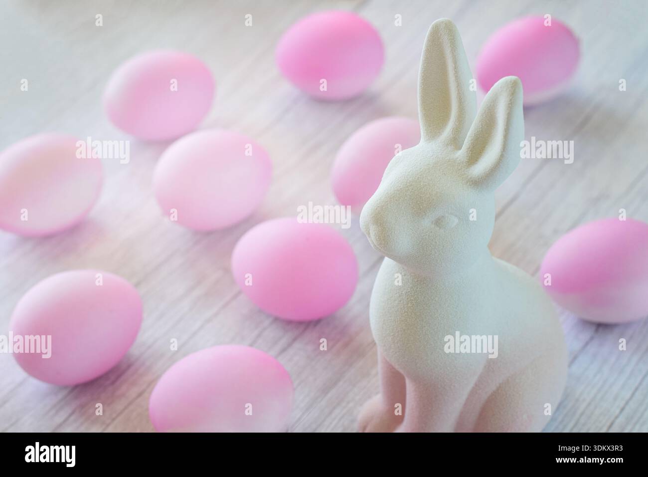 Ceramic Easter bunny and pink eggs Stock Photo