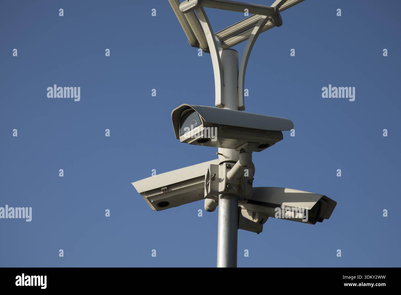 Security camera record live, Security camera on blue sky background Stock Photo