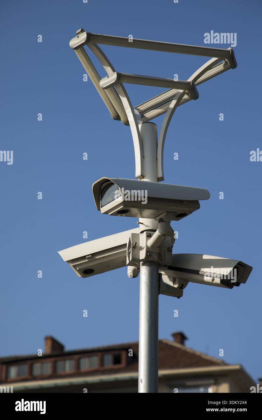 Security camera record live, Security camera on blue sky background Stock Photo