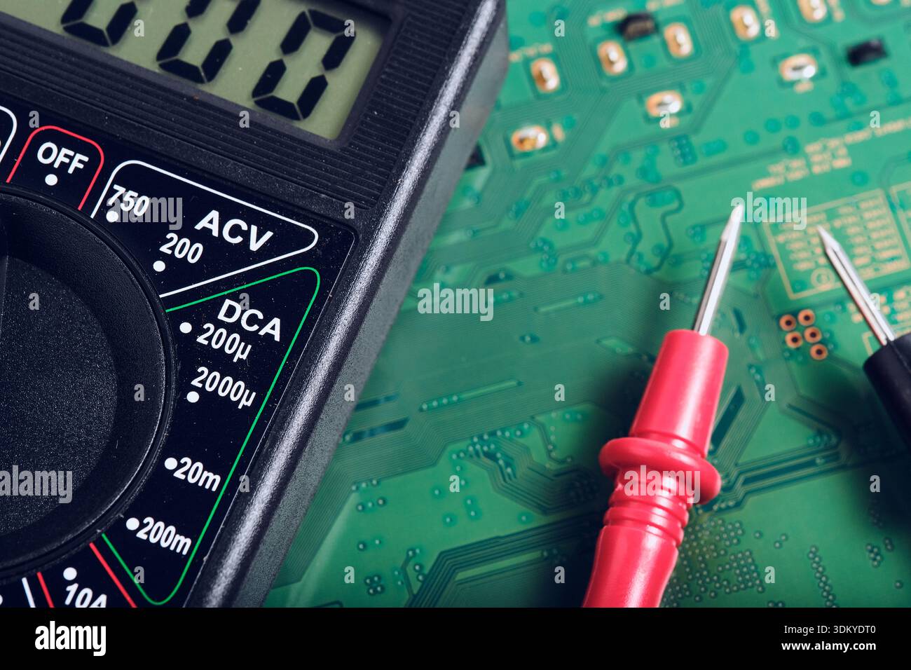 Electronic Testing Probe and Multimeter on PCB Background Stock Photo