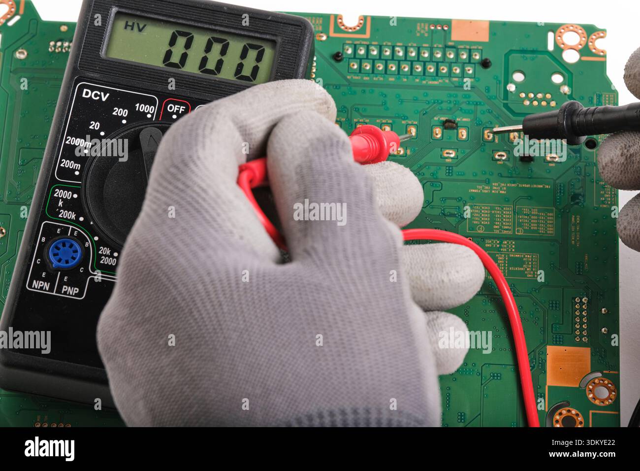 Hardware engineer testing electronic motherboard in service center Stock Photo
