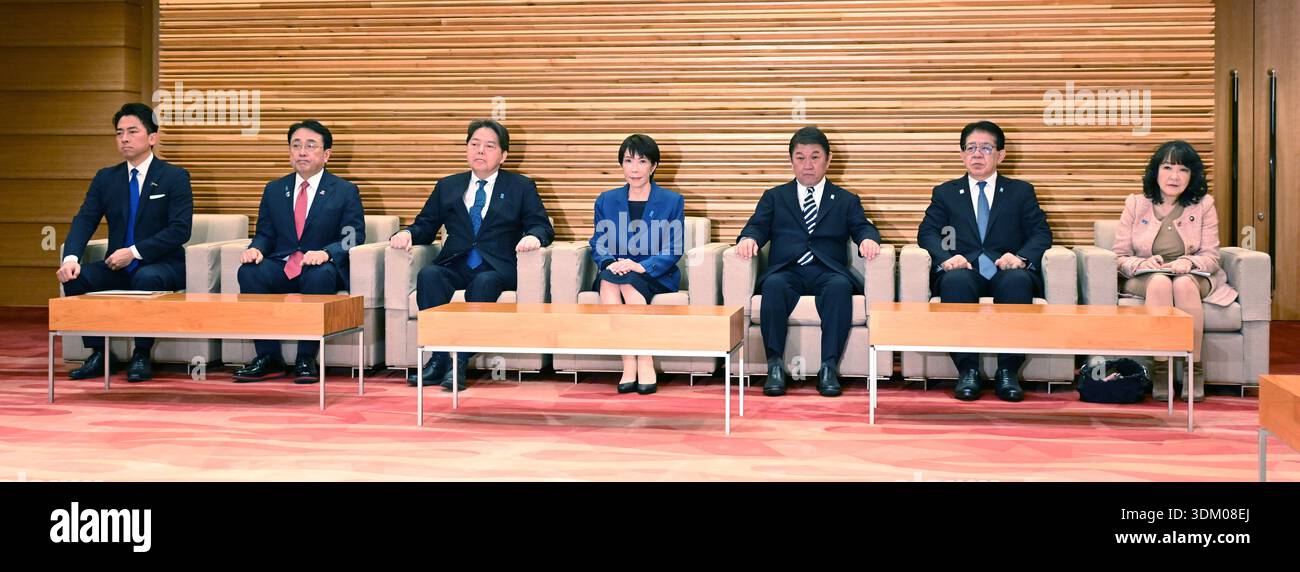 Japanese Prime Minister Sanae Takaichi (C) attends a cabinet meeting at ...