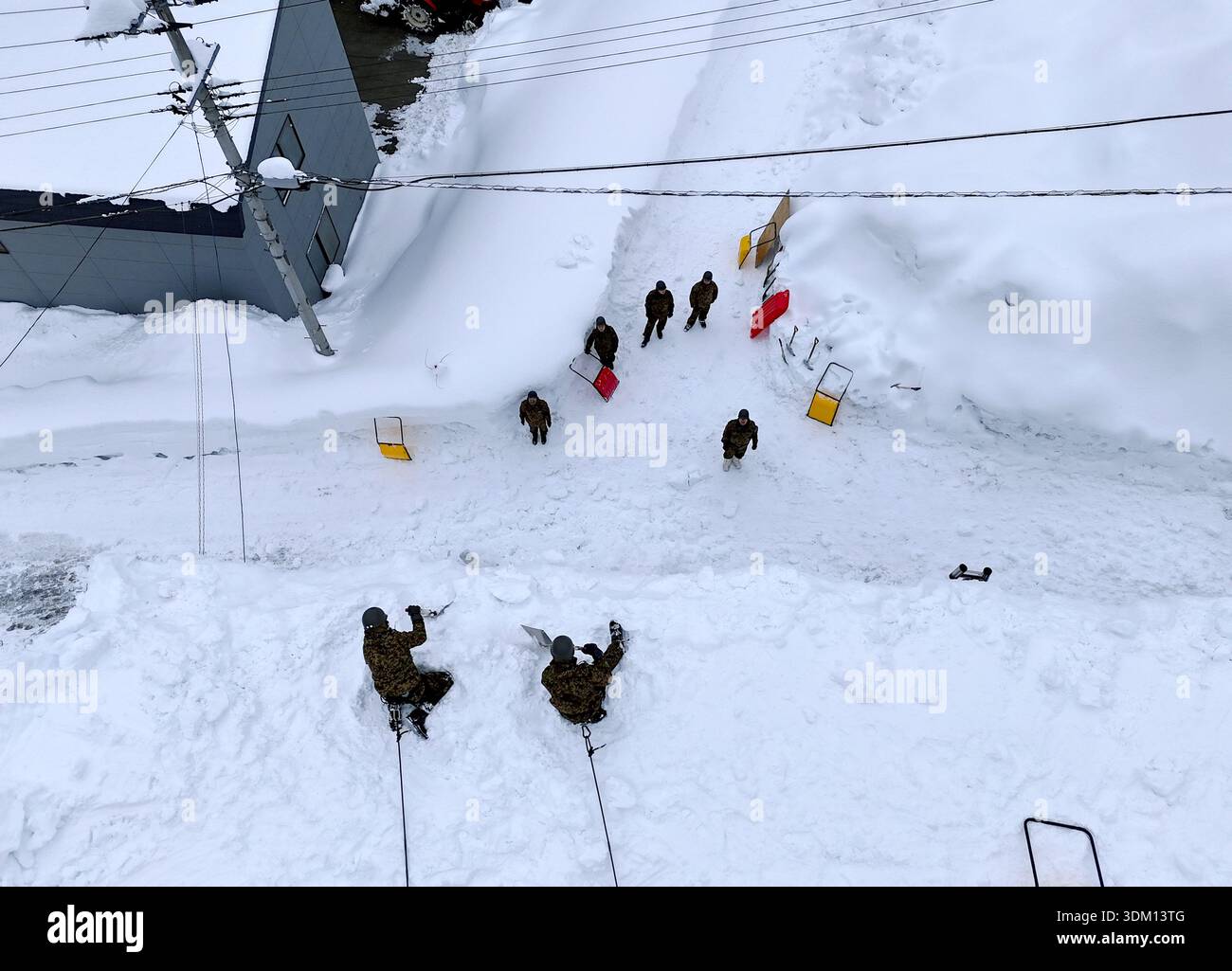 An aerial photo shows members of the Japan Ground Self-Defense Force ...