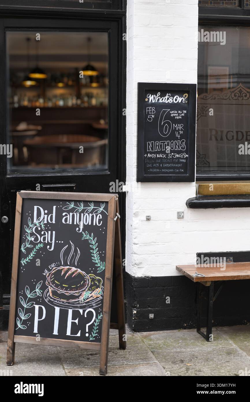 Pub with pie sign Stock Photo