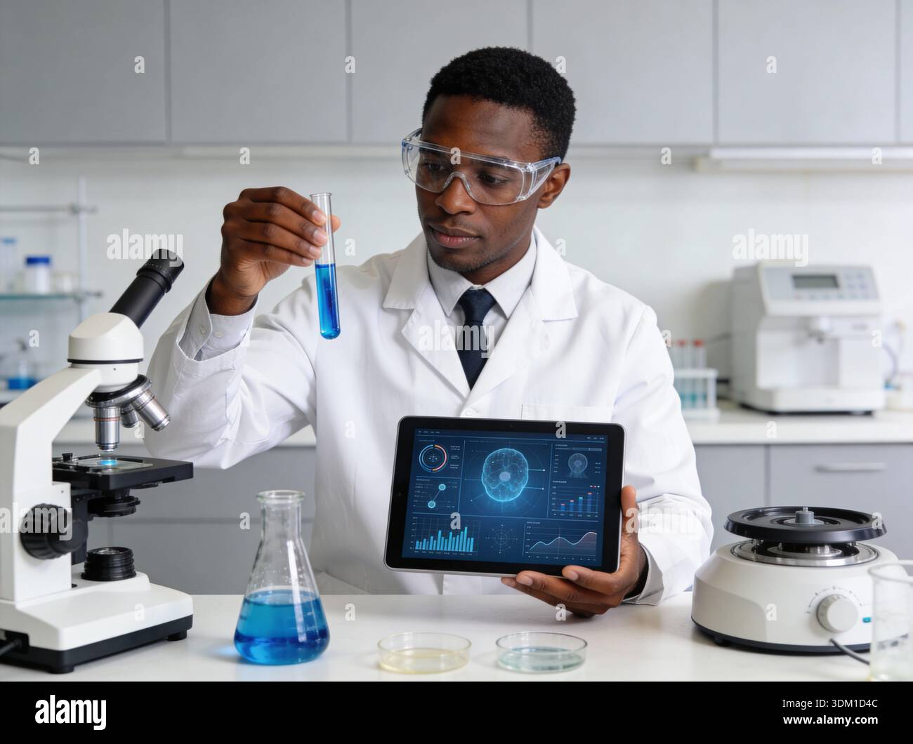 A man in a lab coat holding a tablet with a blue liquid in a beaker. He ...