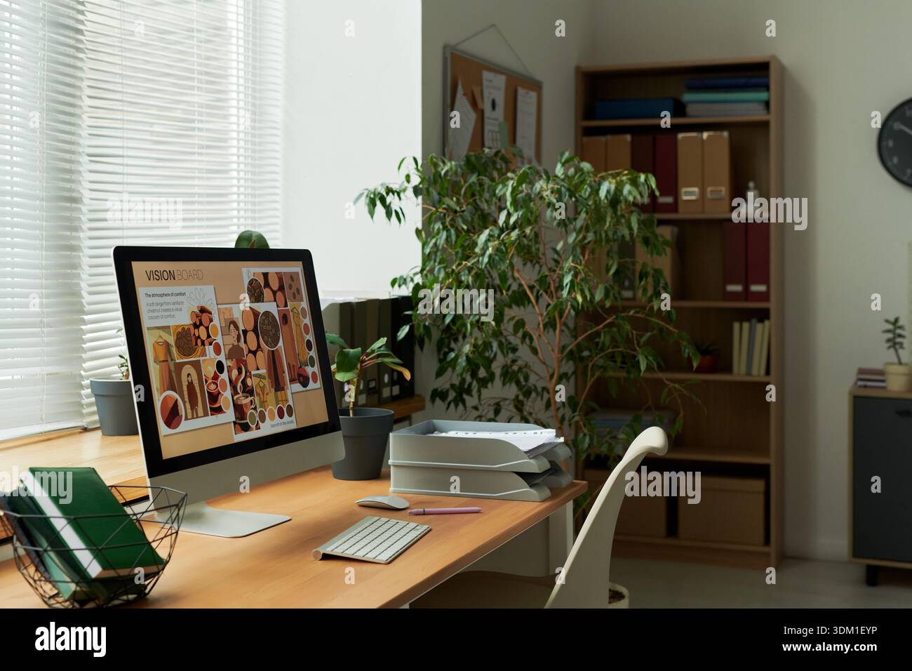 Office Workspace Featuring Computer Displaying Vision Board Design ...