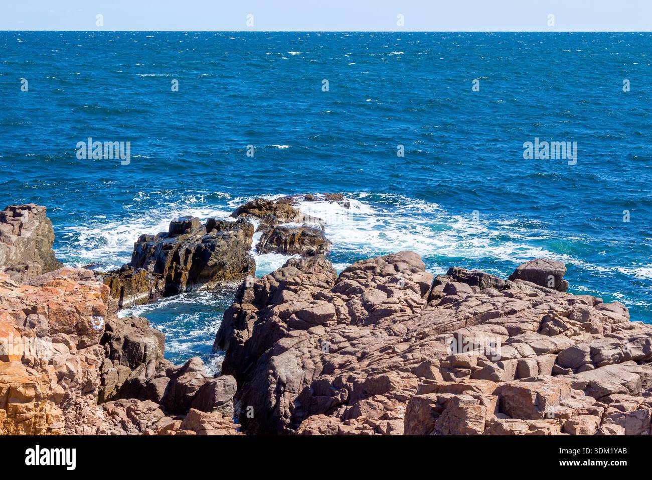 black sea coast on a sunny day. waves crashing rocks. beach near the cape skamni. south bulgaria travel destination. holiday at the seaside of europe. Stock Photo