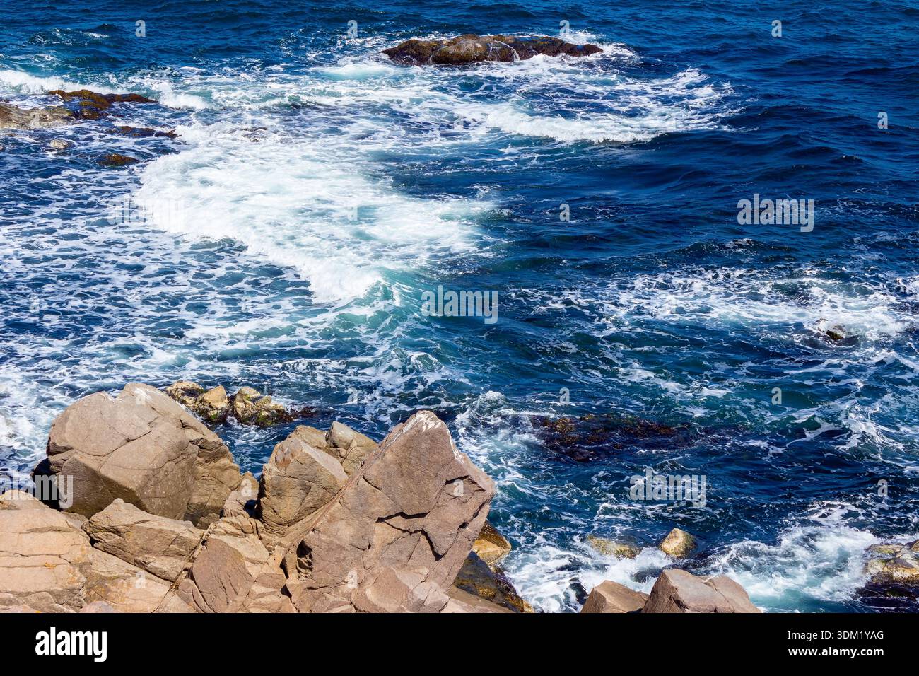 black sea coast on a sunny day. waves crashing rocks. beach near the cape skamni. south bulgaria travel destination. holiday at the seaside of europe. Stock Photo