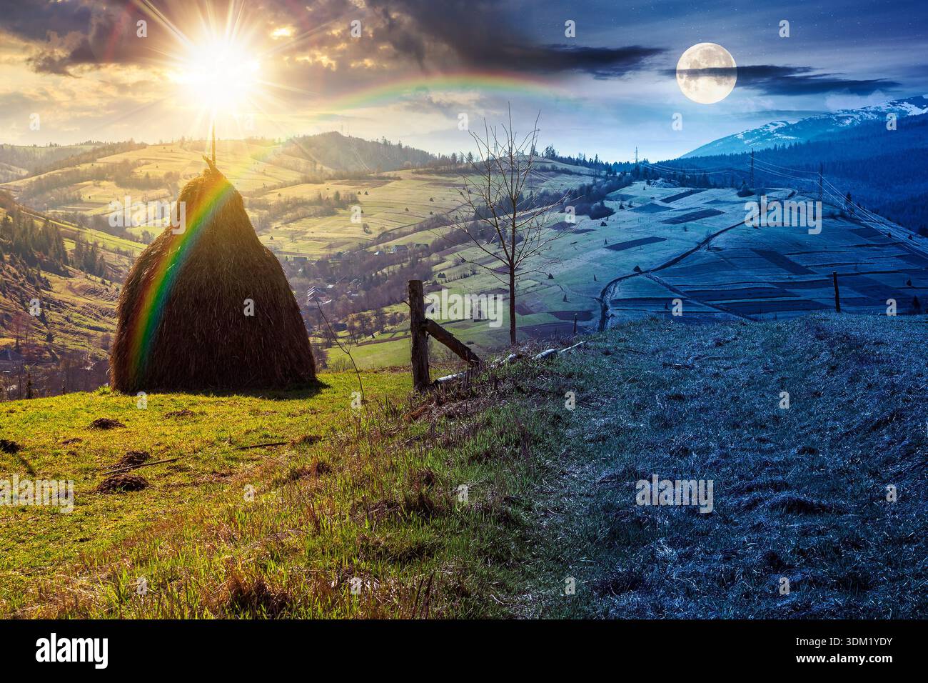 rural landscape in mountains. day and night time change concept. agriculture nature in early spring with sun and moon. cone haystack on green hill. sc Stock Photo
