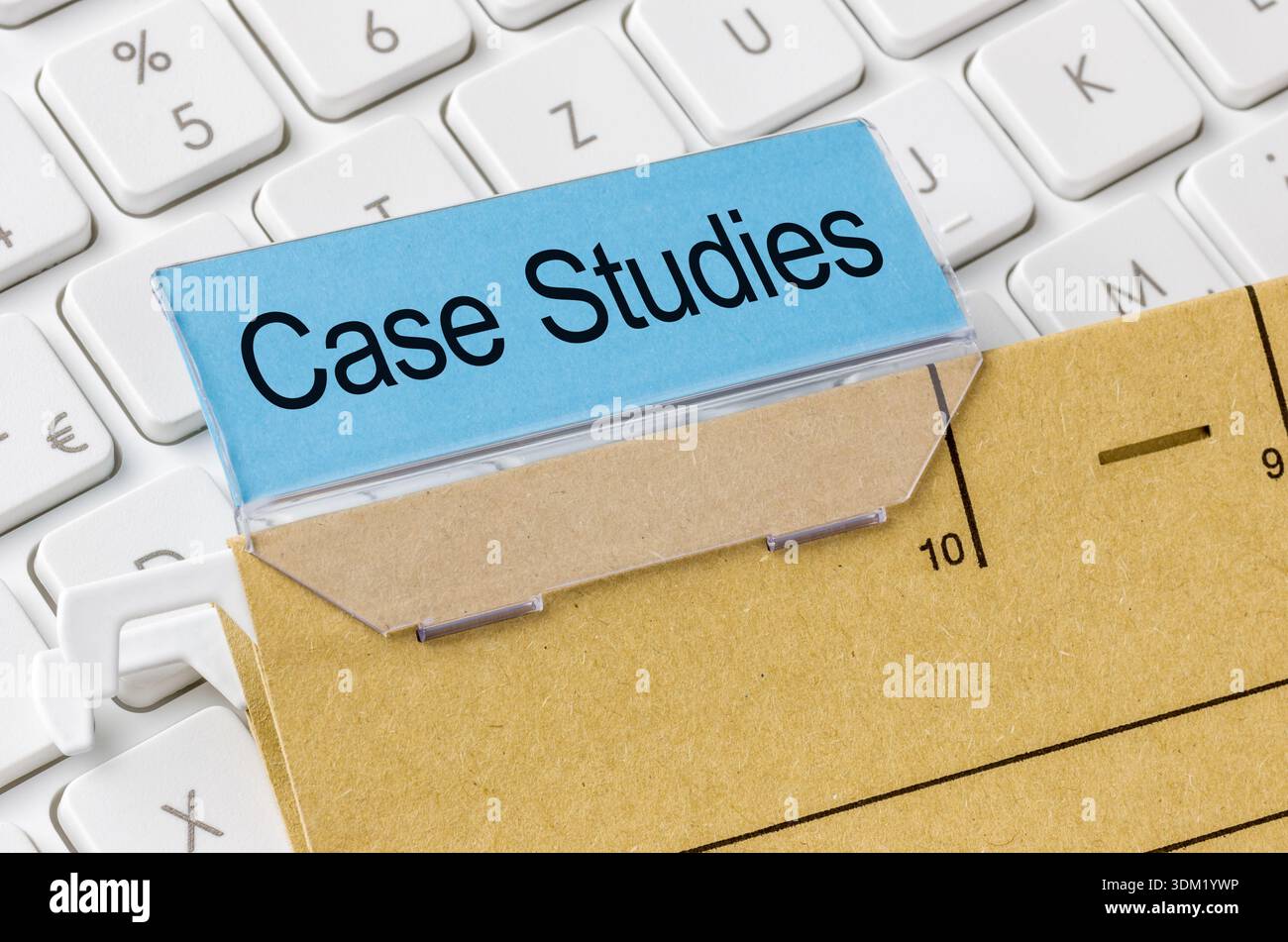 A brown file folder labeled with Case studies Stock Photo