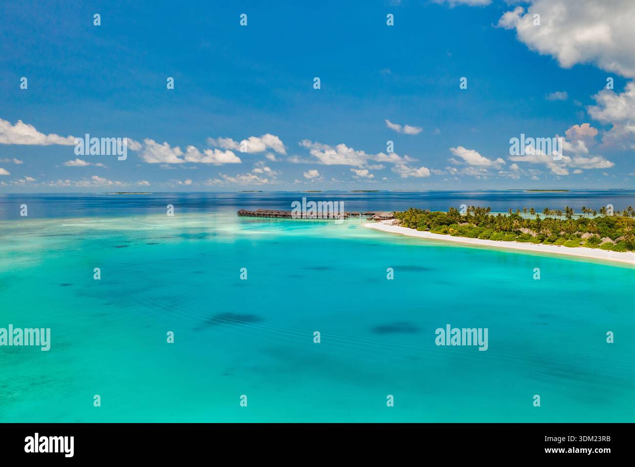 Immersive Maldives aerial island turquoise ocean radiant clouds breathtaking paradise coastal luxury travel destination stunning landscape wallpaper Stock Photo