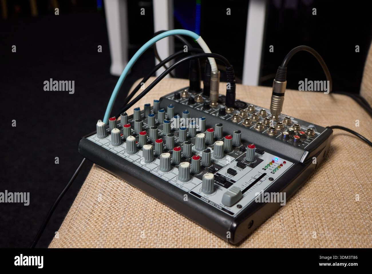 Portable audio device featuring labeled inputs and illumination ...