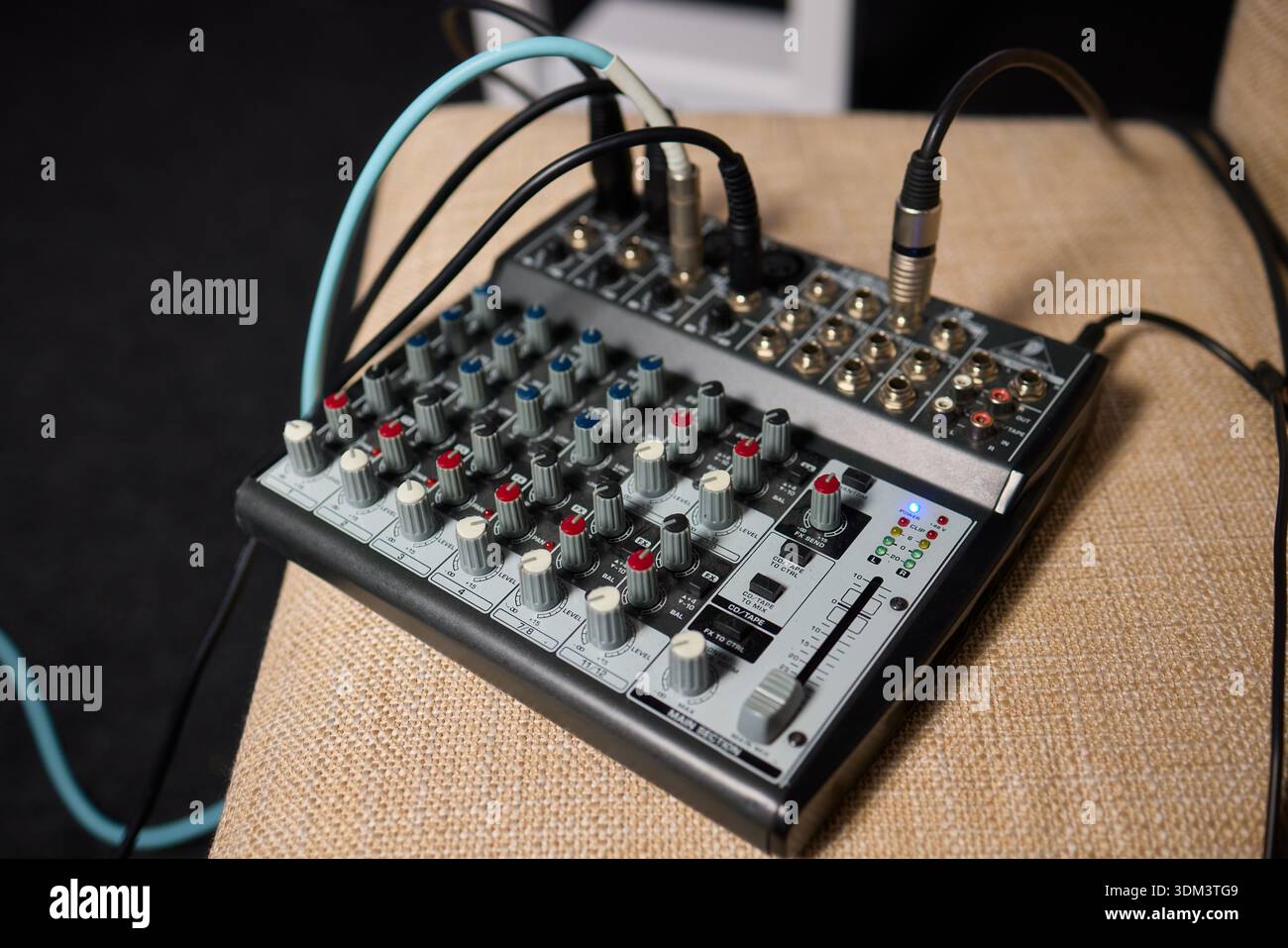 Portable audio device featuring labeled inputs and illumination ...