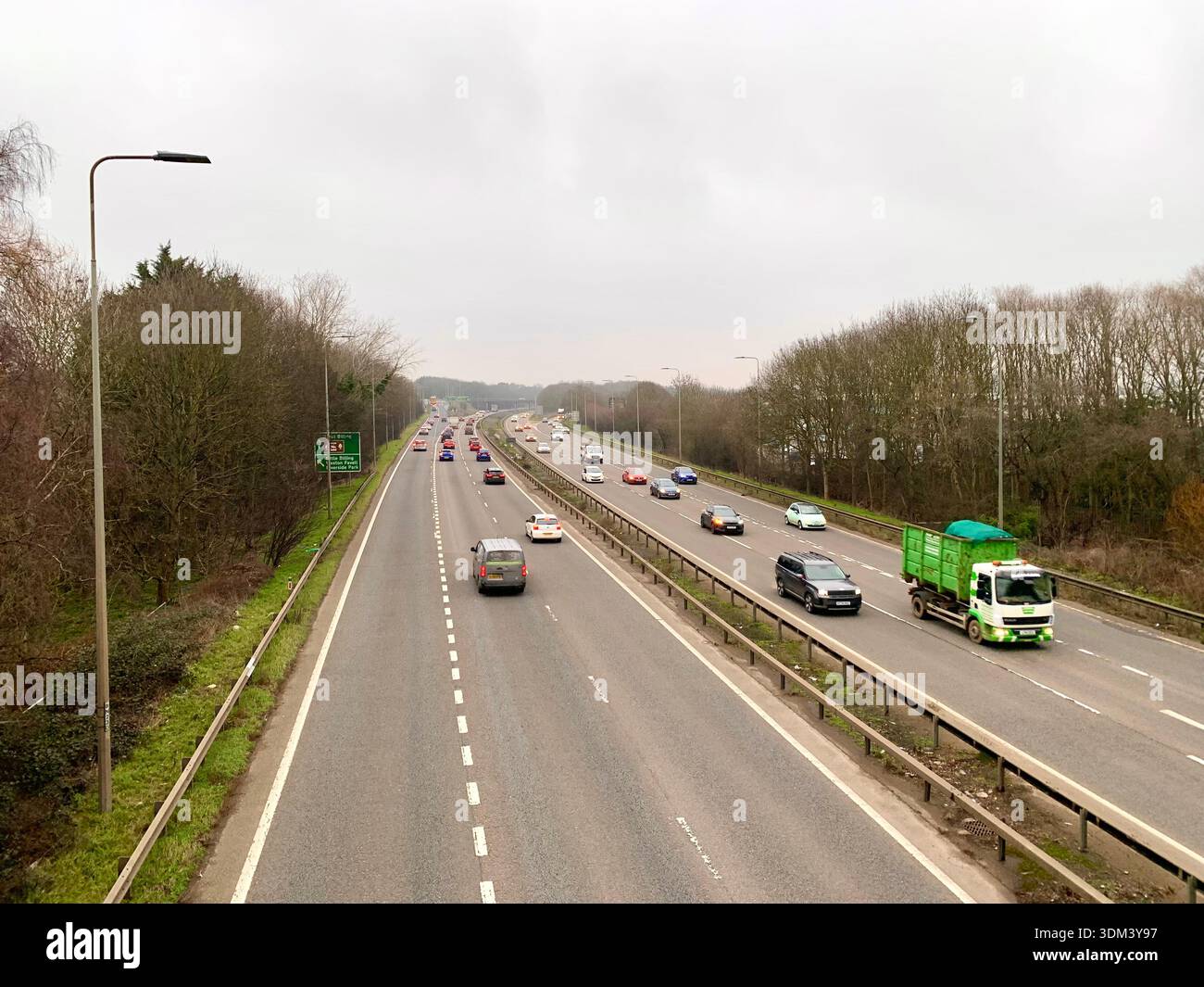 Traffic travelling along the A45 near Northampton Near Weston Favell Bridge on a cloudy rainy day with lorries and cars - Smartphone Captured Stock Image
