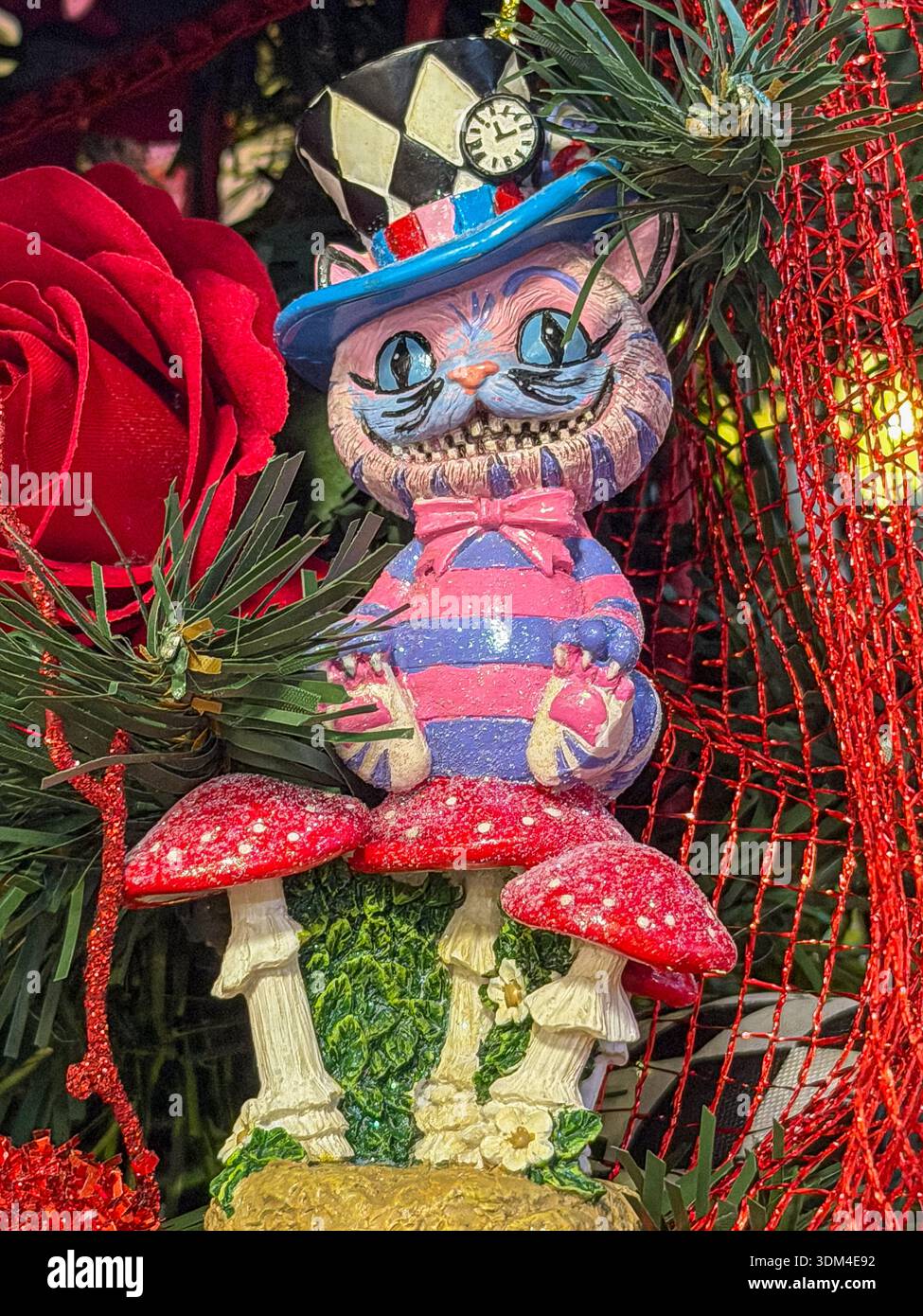 Cheshire cat alice in wonderland hi-res stock photography and