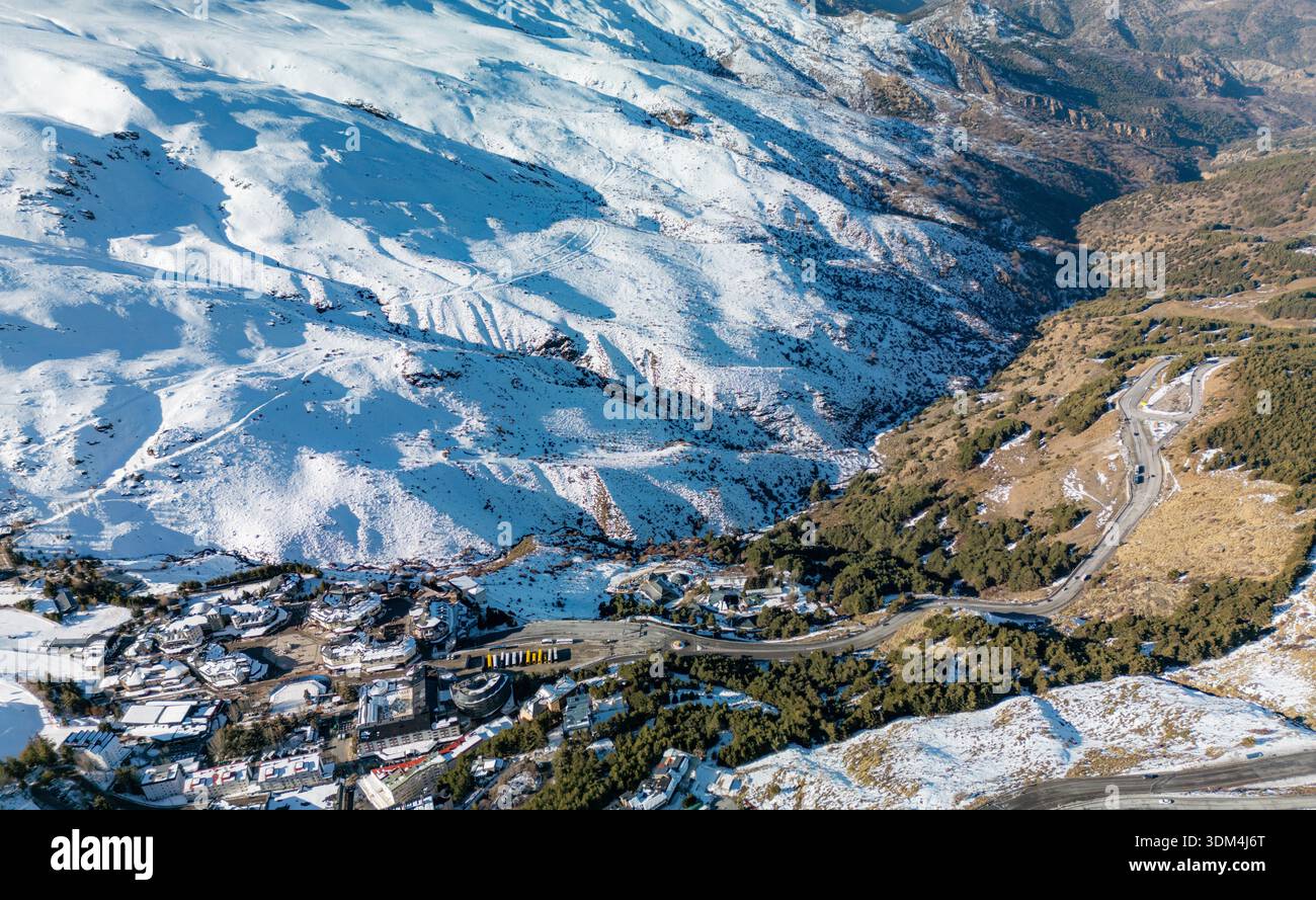 High altitude drone view of Sierra Nevada ski resort in Spain, showing