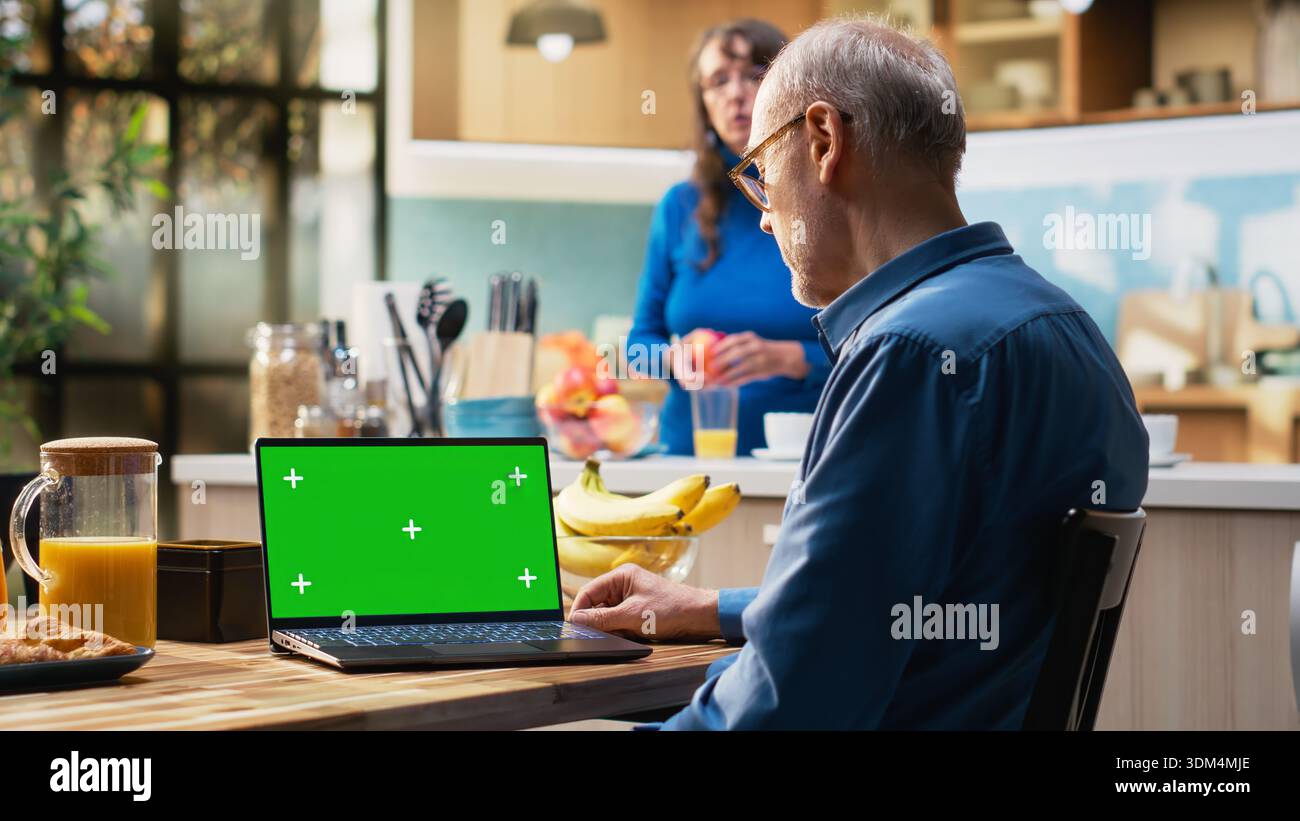 Chroma key laptop retired man hi-res stock photography and images - Alamy