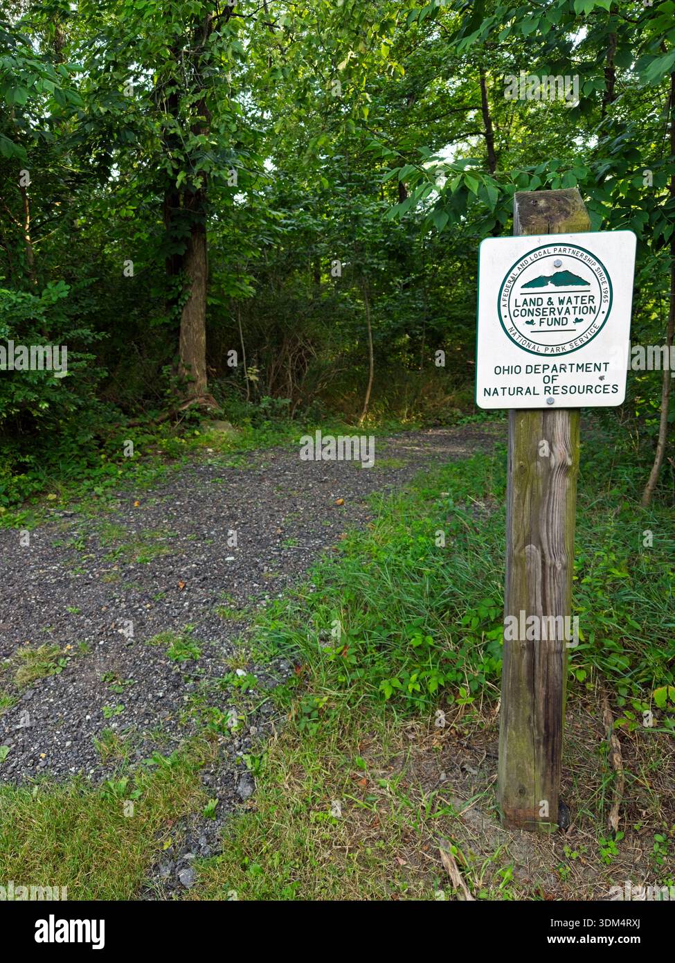 Secluded Sign A sign indicating collaborative funding from various government ...