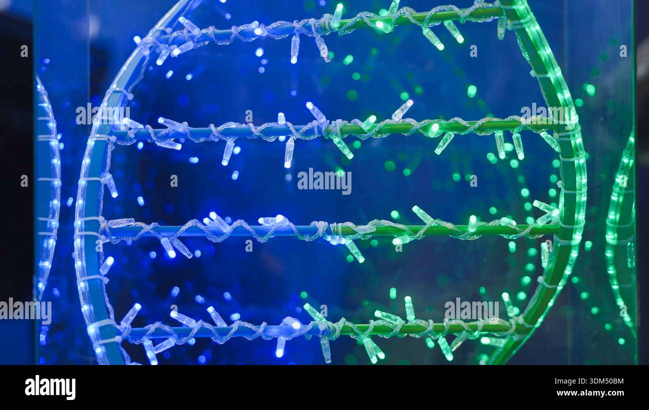 Green glowing double spiral hi-res stock photography and images - Alamy