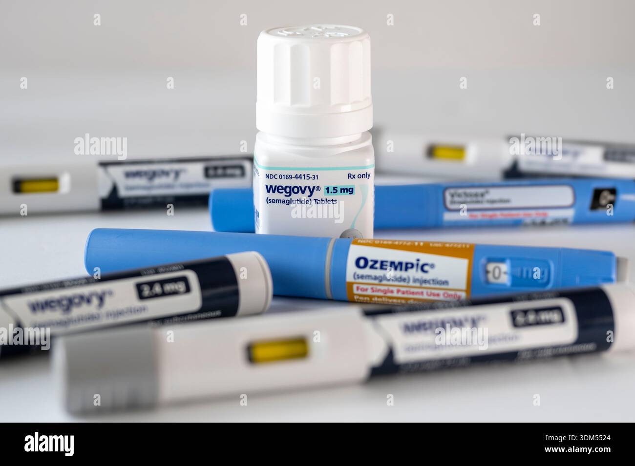 focus semaglutide Photo Illustration of the new Wegovy semaglutide tablets with out of focus injectable prescription weight loss medicines, Ozempic, Victoza and Wegovy Stock Photo