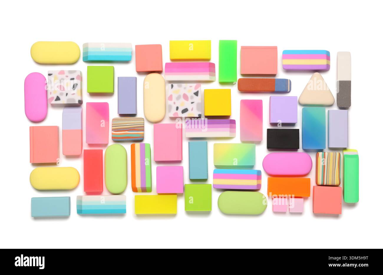 Many colorful rubber erasers on white background Stock Photo