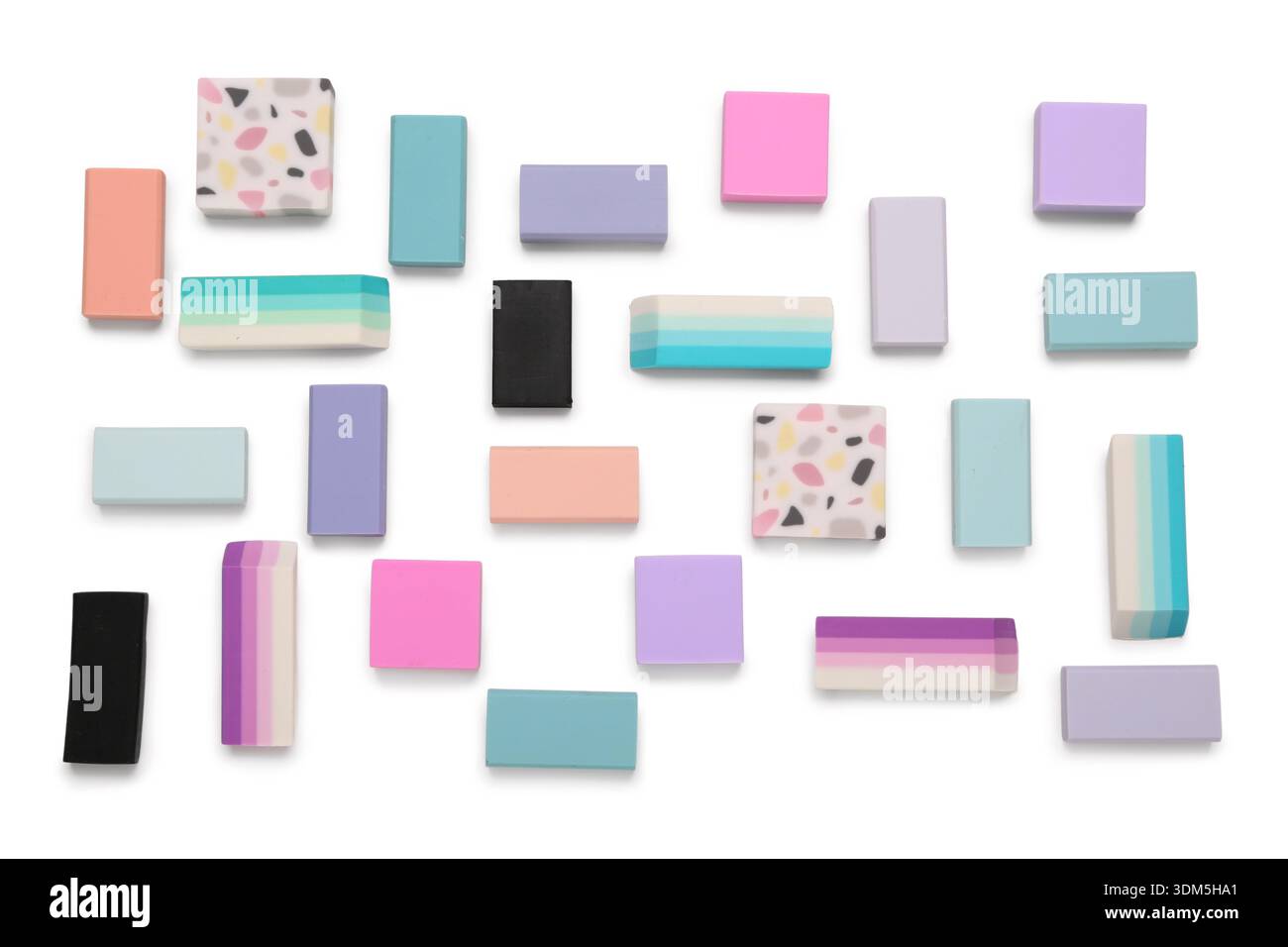 Many colorful rubber erasers on white background Stock Photo