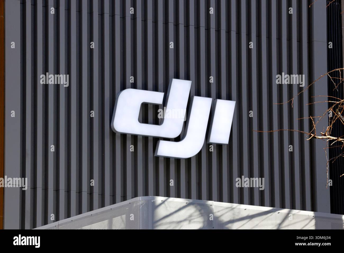 Signage for DJI (Shenzhen Da Jiang Innovations), a Chinese technology company. DJI manufactures drones, and aerial photography equipment. Stock Photo