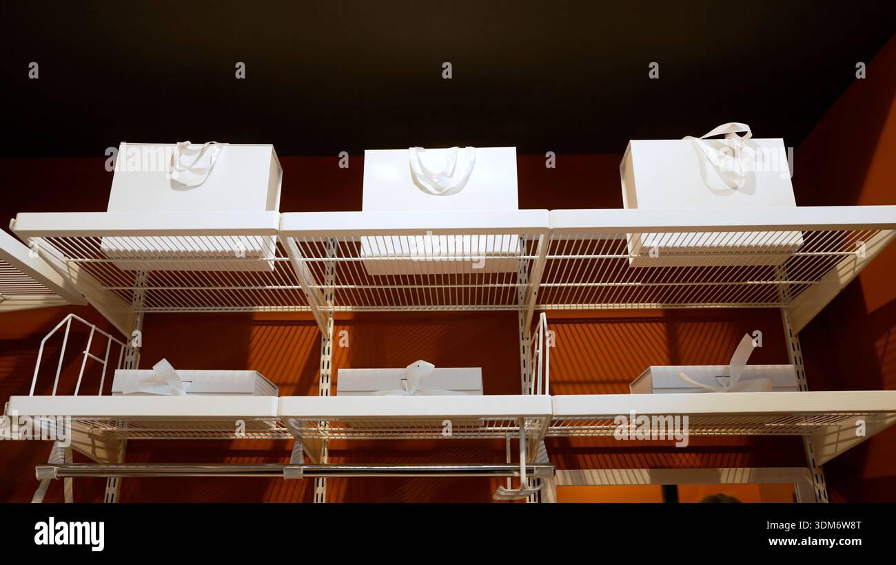 White wire shelving system hi-res stock photography and images - Alamy