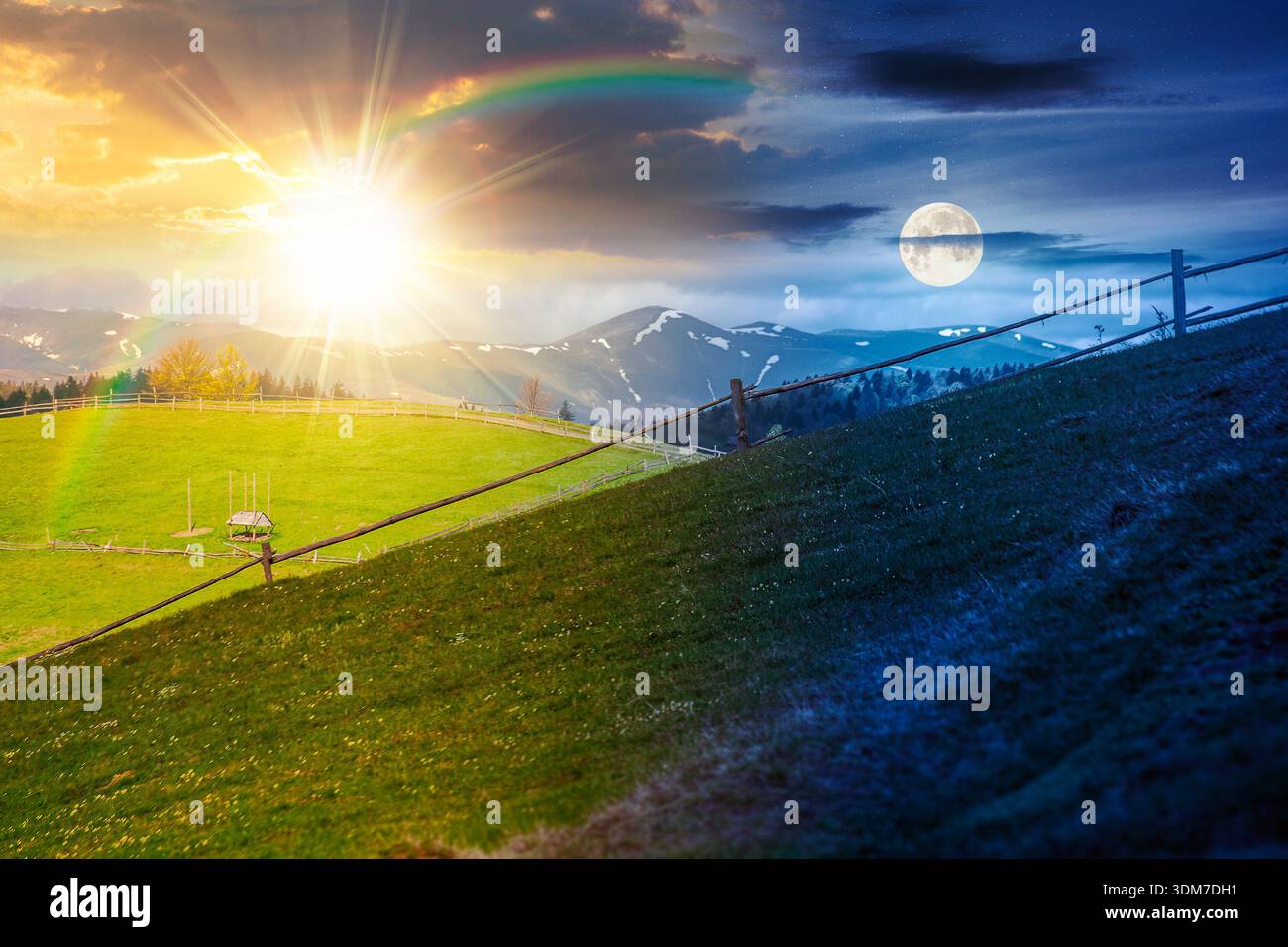 green rural landscape with wooden fence. day and night time change concept. countryside scene with rolling hill in spring with sun and moon at twiligh Stock Photo