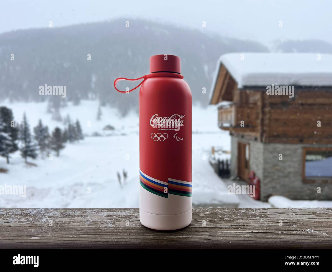 Livigno, Italy - February 3, 2026: Branded Coca Cola volunteer