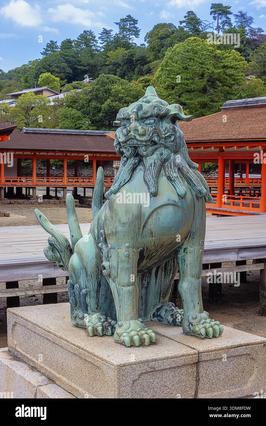 Komainu at itsukushima shrine hi-res stock photography and images