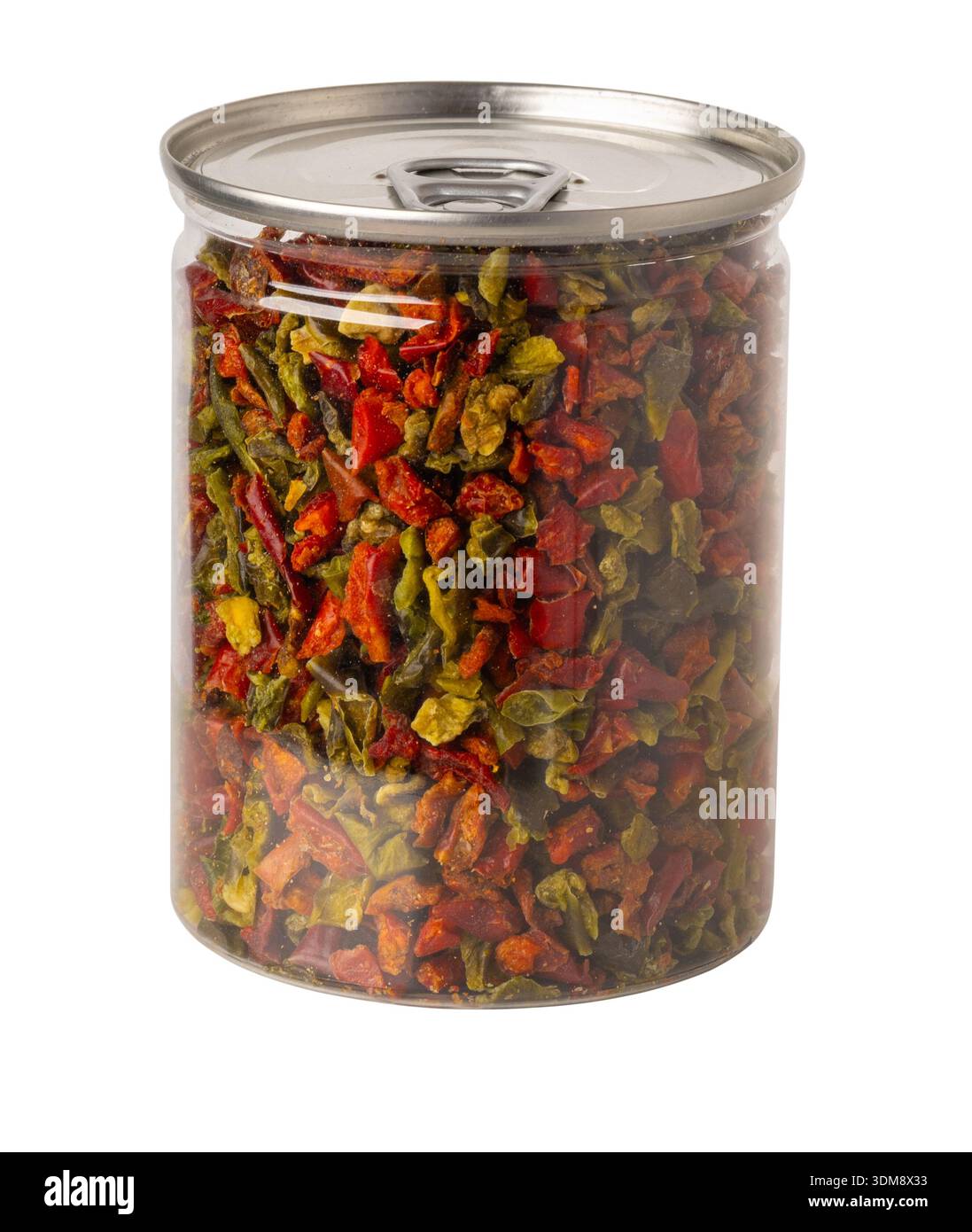 Dried chopped red and green bell peppers filling a transparent spice ...