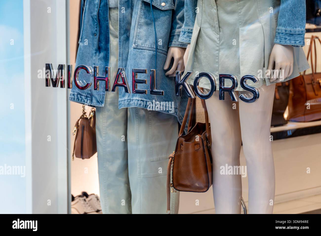 Detail of the window of a Michael Kors boutique. Michael Kors is a brand and chain of fashion stores created by the American designer Michael Kors Stock Photo