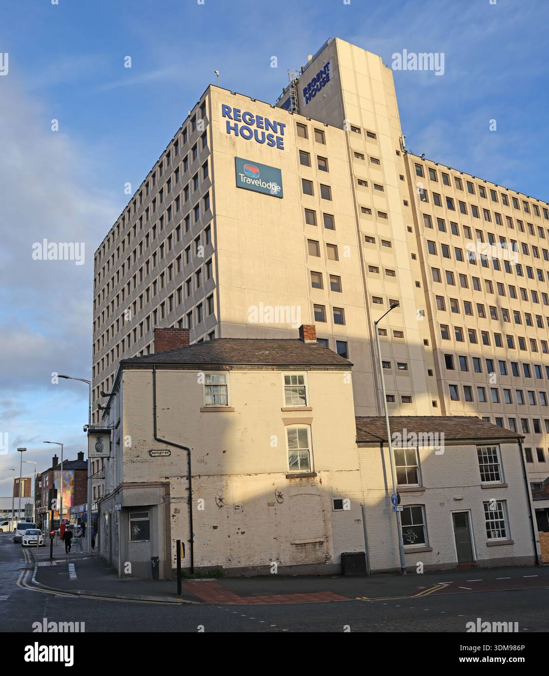Regent House high-rise in Stockport town centre with Travelodge branding, showing the former office tower now used as the Travelodge Stockport hotel Stock Photo
